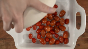 preparing the tomatos for mozzarela pasta