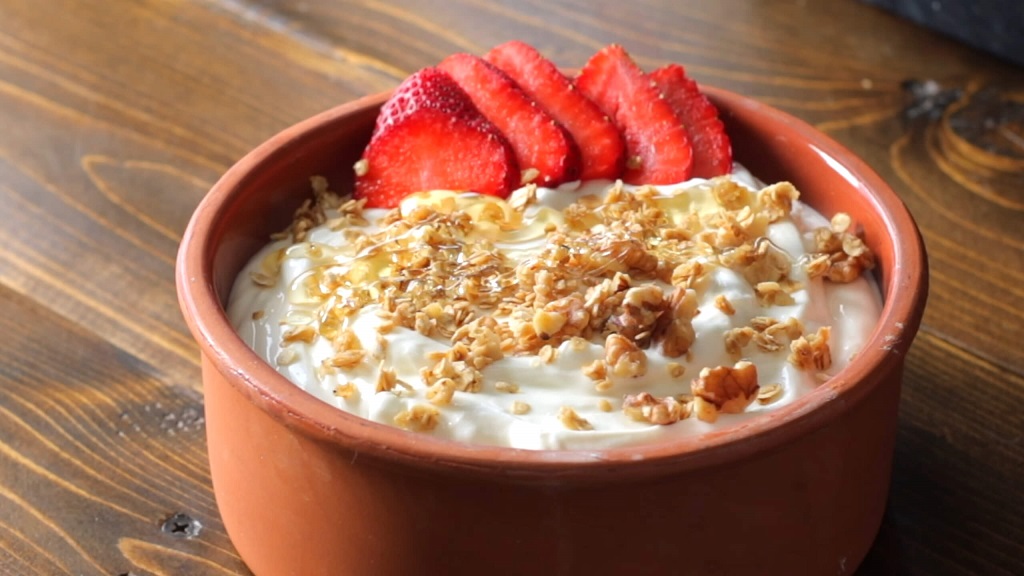 Greek yogurt with seeds and strawberries