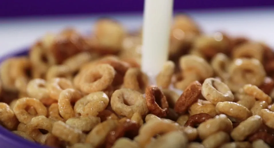 Close up photo of cheerios in milk