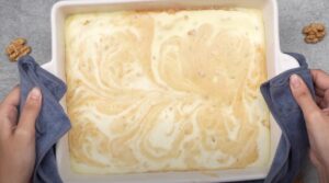 A creamy, marbled custard mixture is ready for the oven