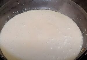 The pan is filled with a smooth, creamy liquid