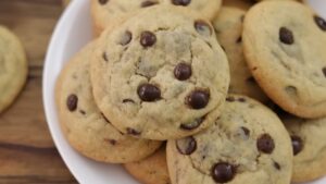 A Plate Piled with Freshly Baked Chocolate Chip Cookies, Ready to Serve